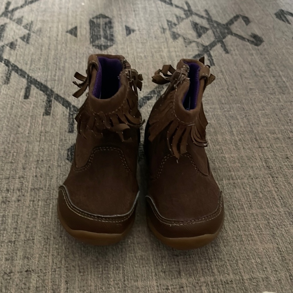 Surprise brown boots